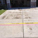 Before- Driveway pitted & Cracked